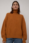 Baserange Mea Turtleneck in Clair Orange