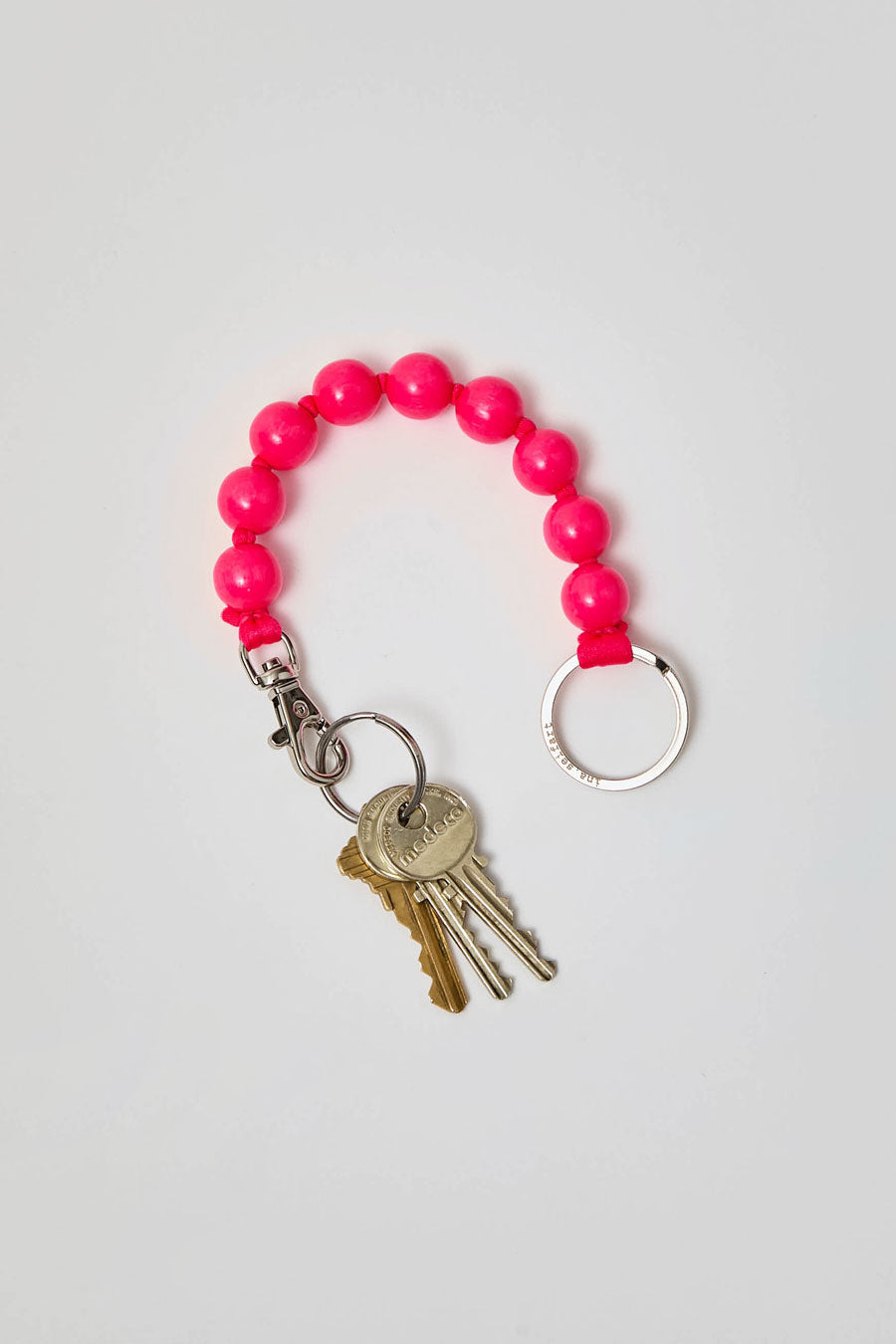 Ina Seifart Dicke Perlen Short Keyholder in Neon Pink