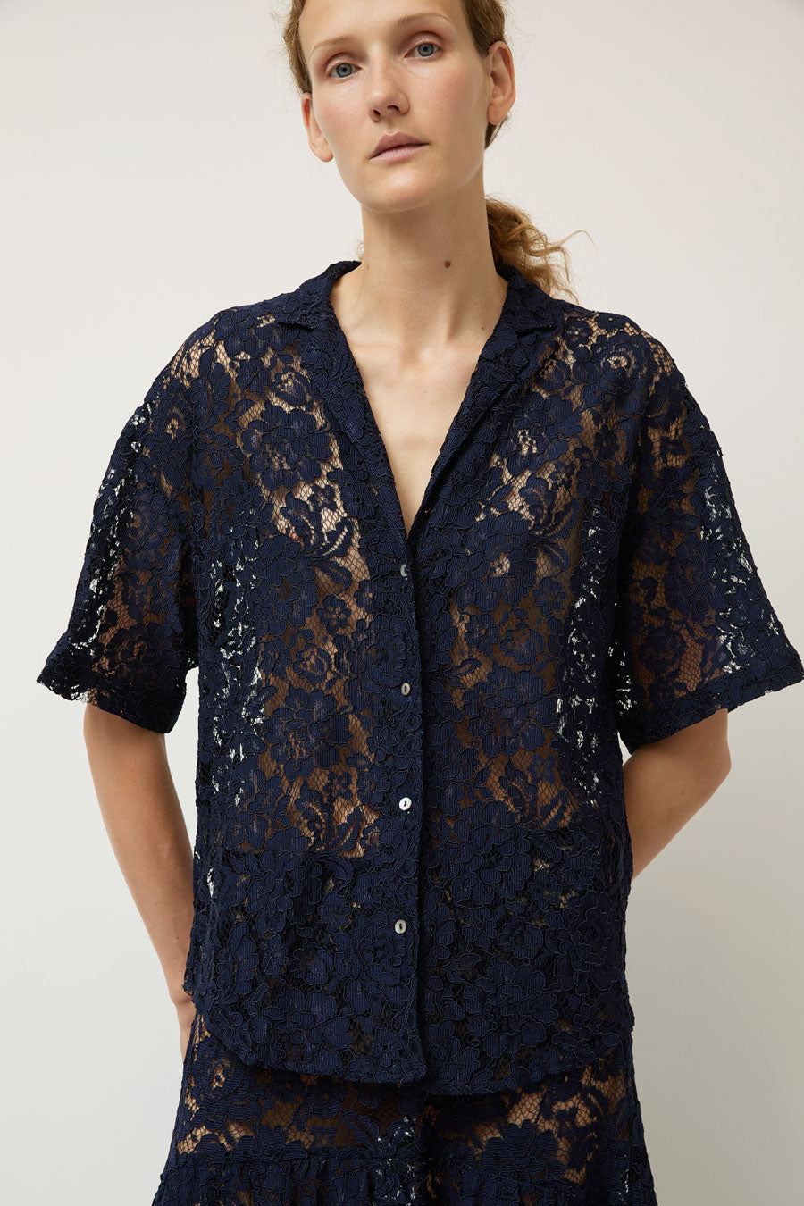 A Bronze Age Romeo Top in Navy Lace