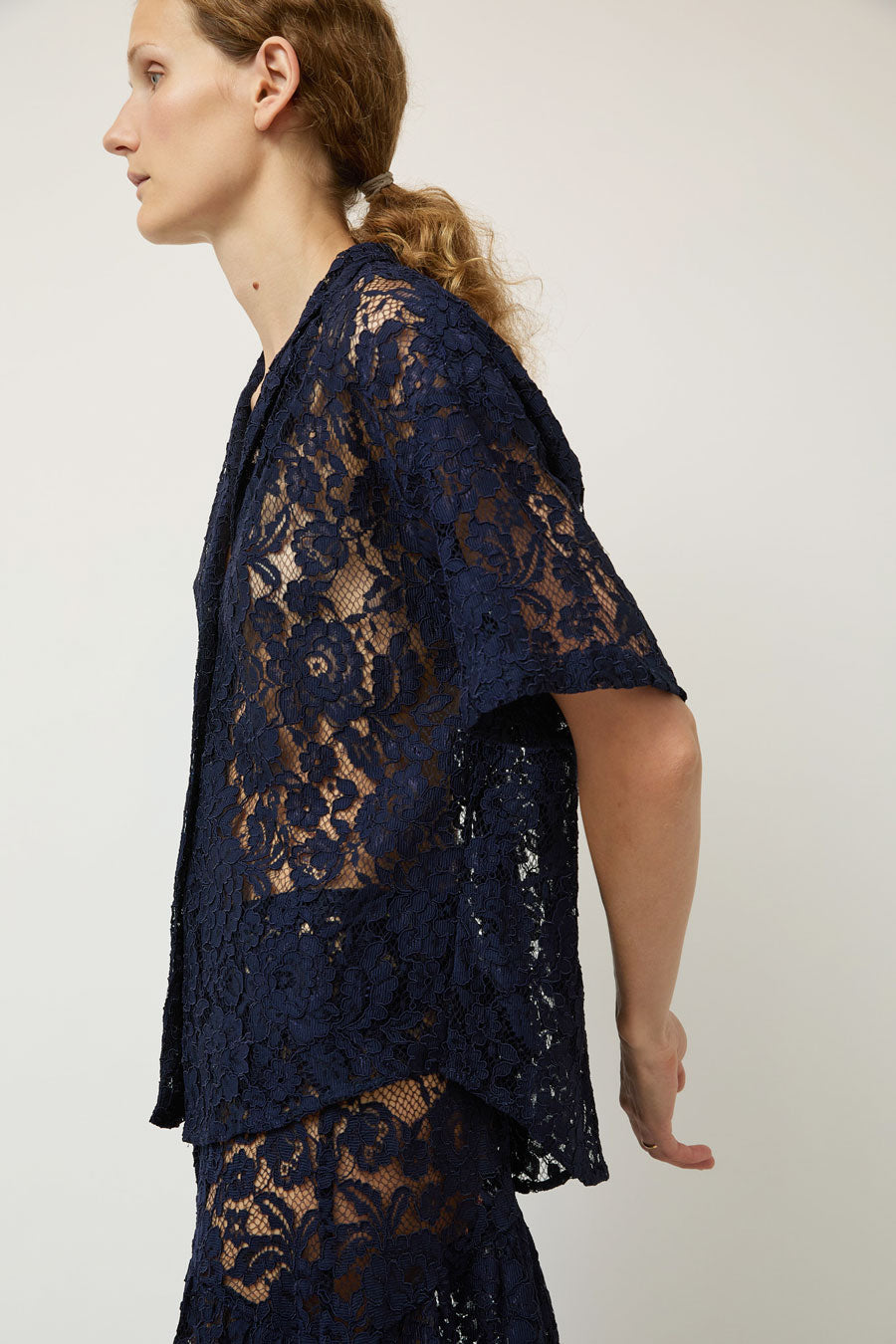 A Bronze Age Romeo Top in Navy Lace