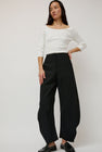 Amomento Curved Silhouette Pants in Black