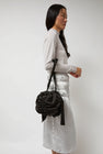 Anggae Satin Mini Ball Bag in Black