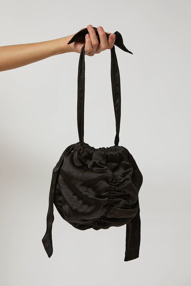 Anggae Satin Mini Ball Bag in Black