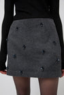 Atelier Edition Flower Embellished Mini Skirt in Dark Gray