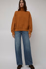 Baserange Mea Turtleneck in Clair Orange