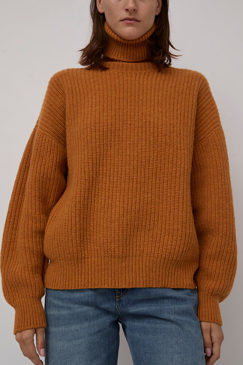 Baserange Mea Turtleneck in Clair Orange