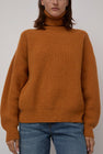 Baserange Mea Turtleneck in Clair Orange