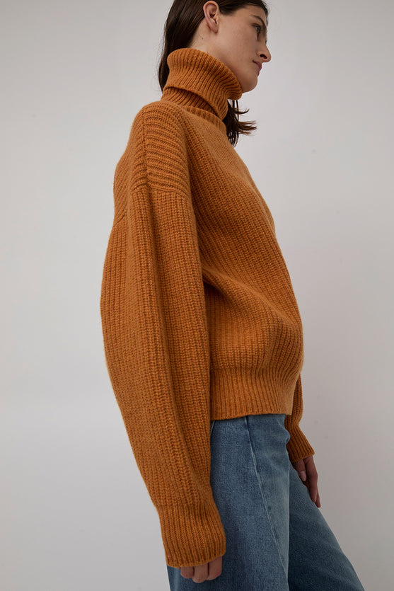 Baserange Mea Turtleneck in Clair Orange