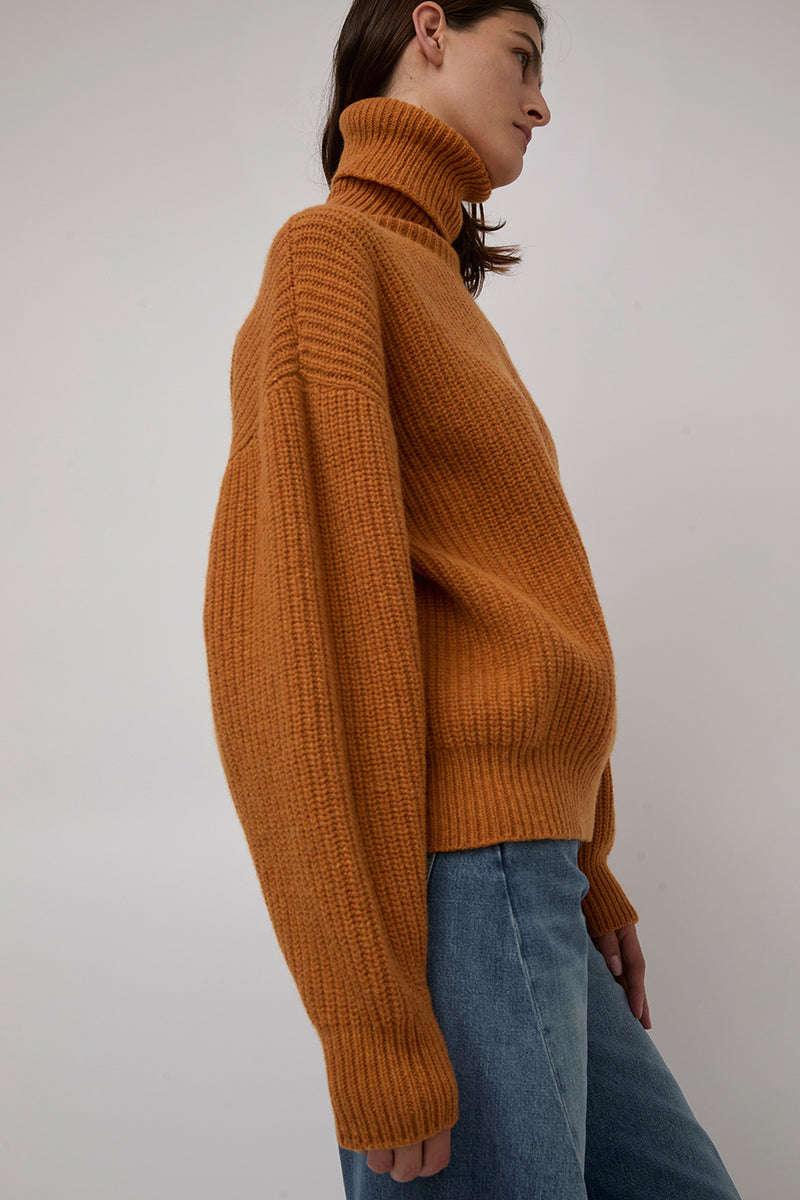 Baserange Mea Turtleneck in Clair Orange
