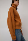 Baserange Mea Turtleneck in Clair Orange