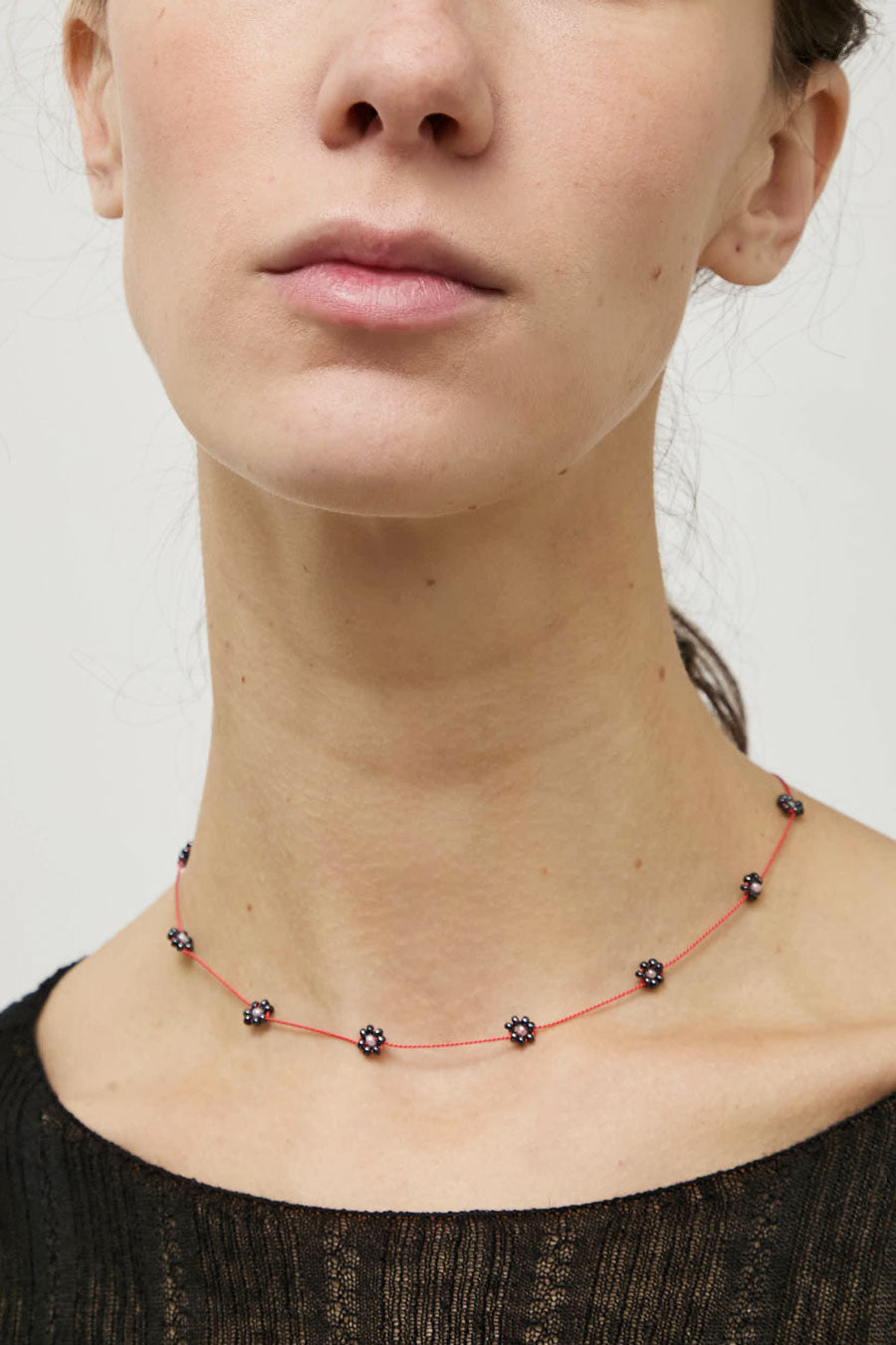 Berni Gunmetal Bloom Necklace in Metallic Beads and Coral Silk
