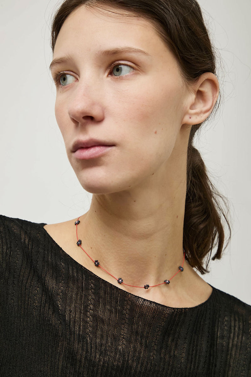 Berni Gunmetal Bloom Necklace in Metallic Beads and Coral Silk