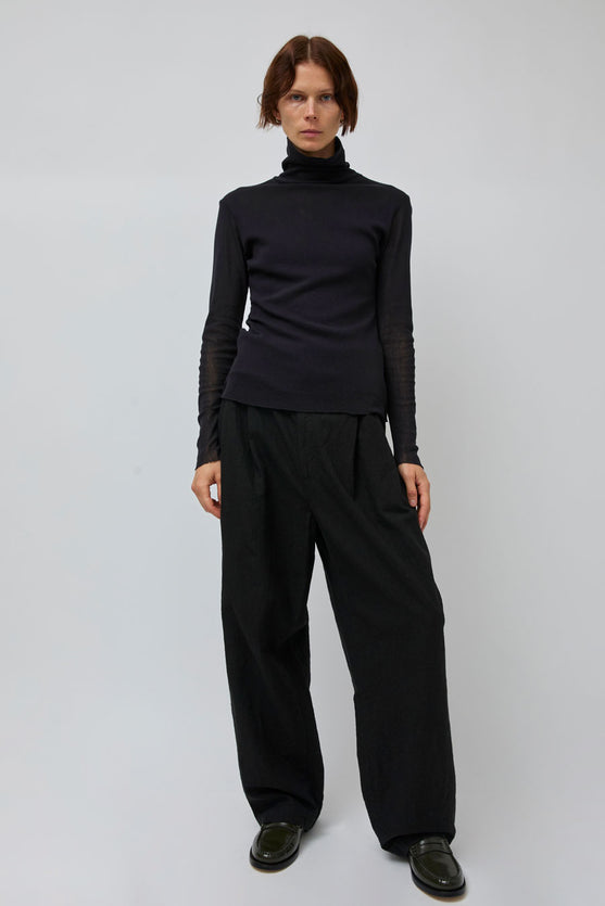 Black Crane Crinkled Trousers in Black