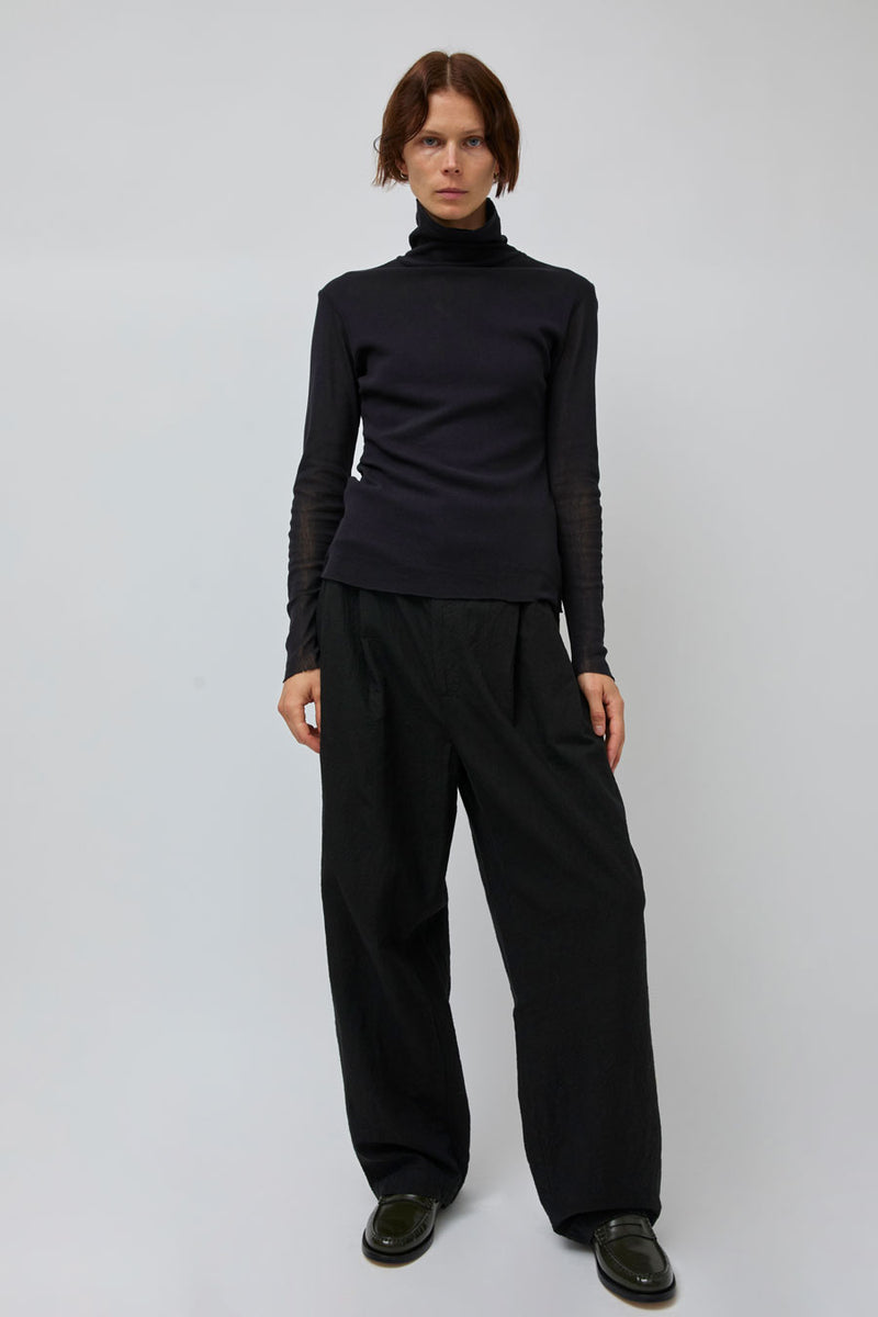 Black Crane Crinkled Trousers in Black