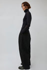 Black Crane Crinkled Trousers in Black