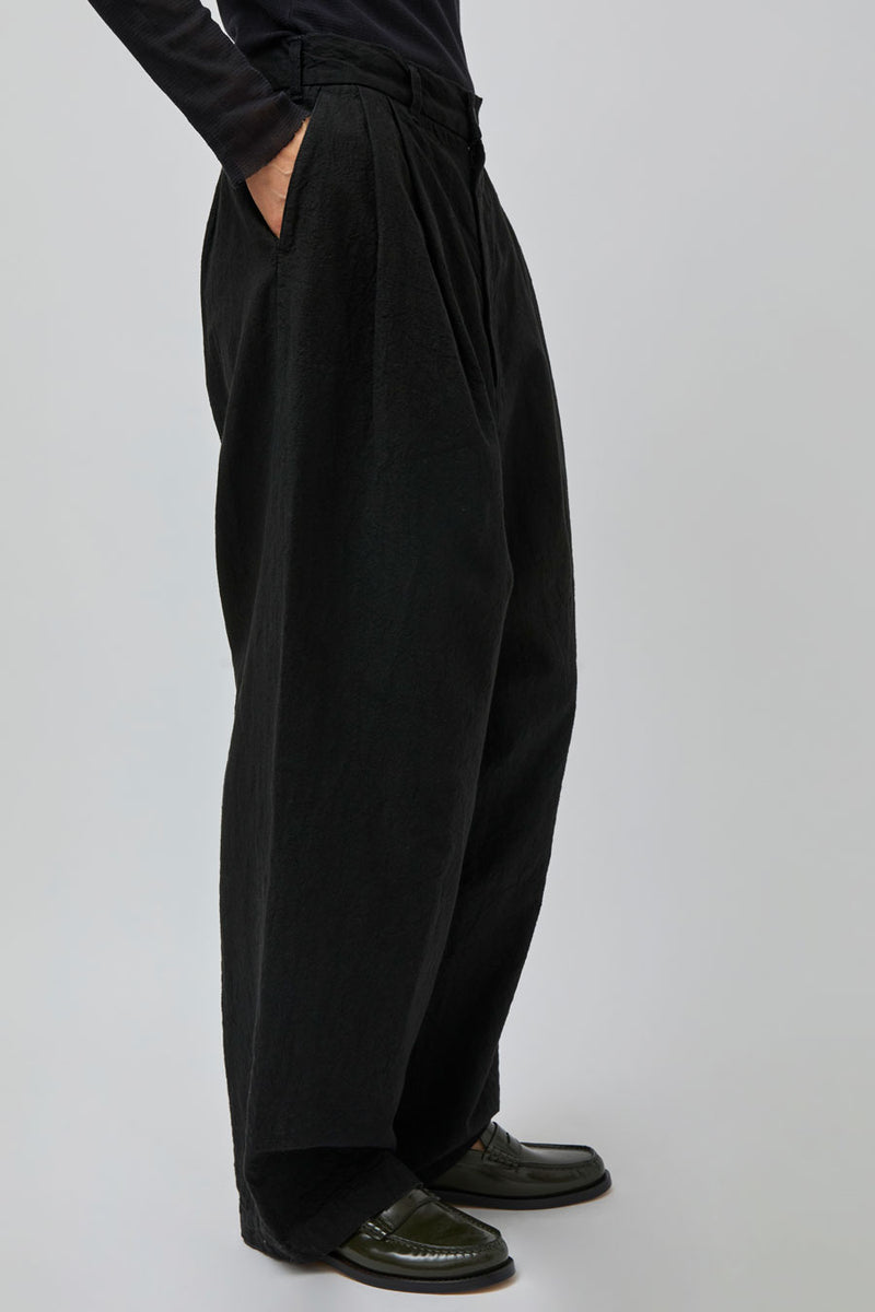 Black Crane Crinkled Trousers in Black