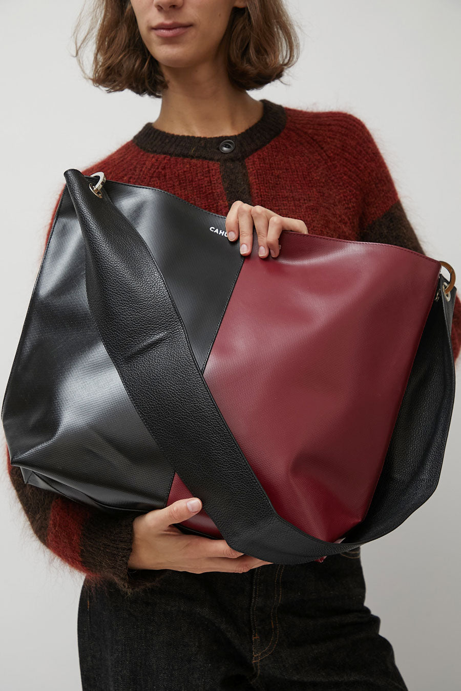 Cahu Diagonol Bigout Bag in Black and Burgundy