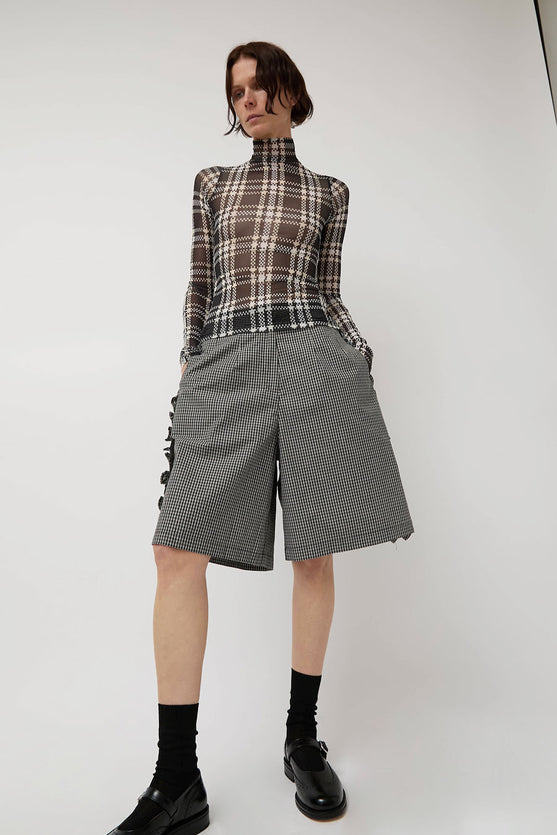 KkCo Split Turtleneck in Mixed Plaid