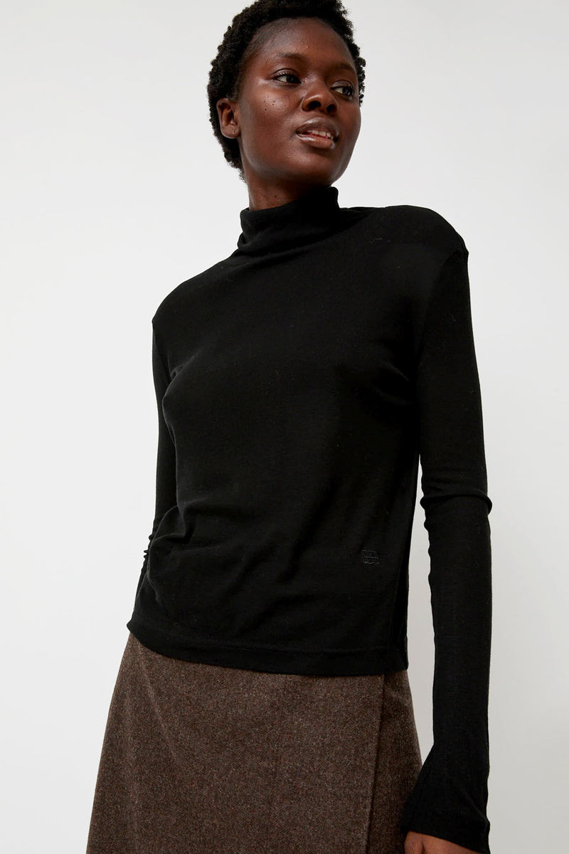 Black ribbed roll neck top best sale