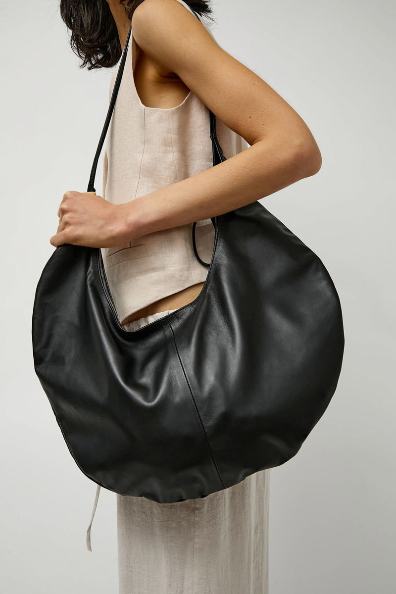 Modern Weaving Half Moon Zip Crossbody Bag in Black