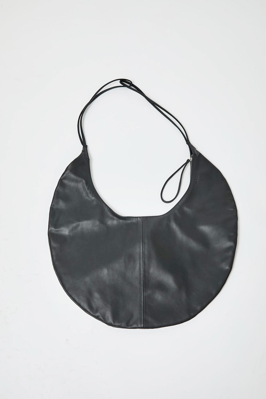 Modern Weaving Half Moon Zip Crossbody Bag in Black