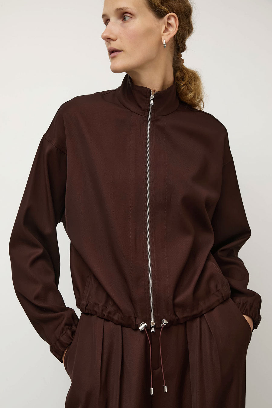 NOMIA Double Zip Top in Carob
