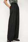 NOMIA Wide Leg Pleated Trouser in Black