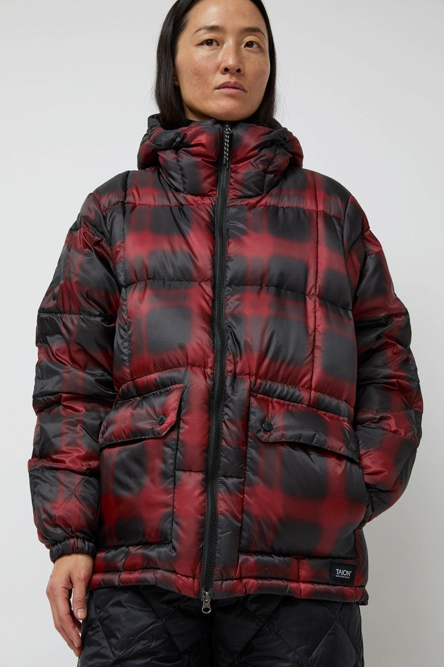 TAION Mountain Packable Volume Down Hoodie in Black and Red Check