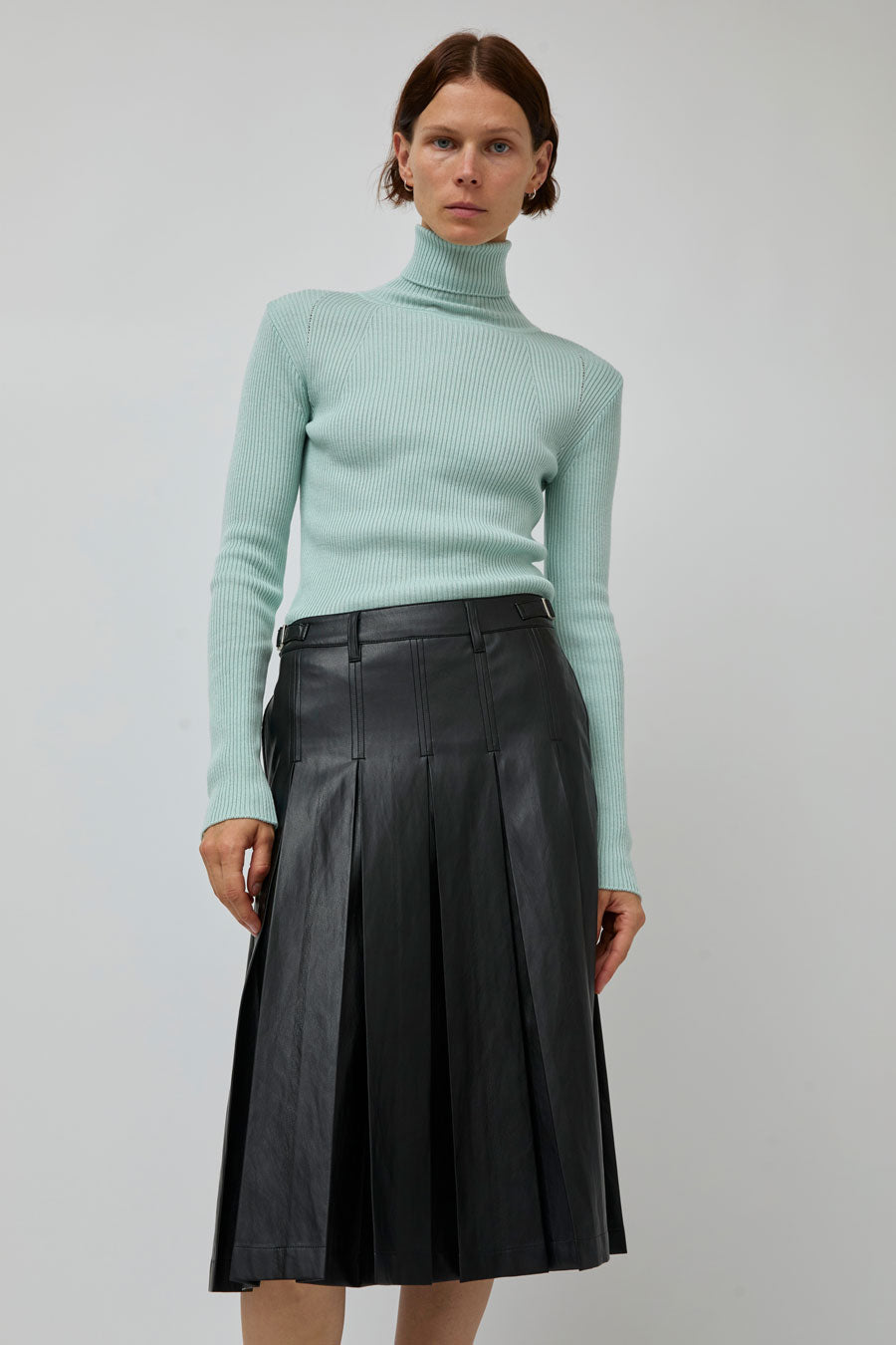 TONYWACK Faux Leather Pleated Midi Skirt in Black