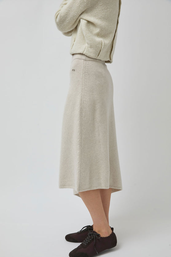 UMARMUNG Asymmetric Hem Skirt in Lamb