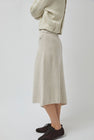 UMARMUNG Asymmetric Hem Skirt in Lamb