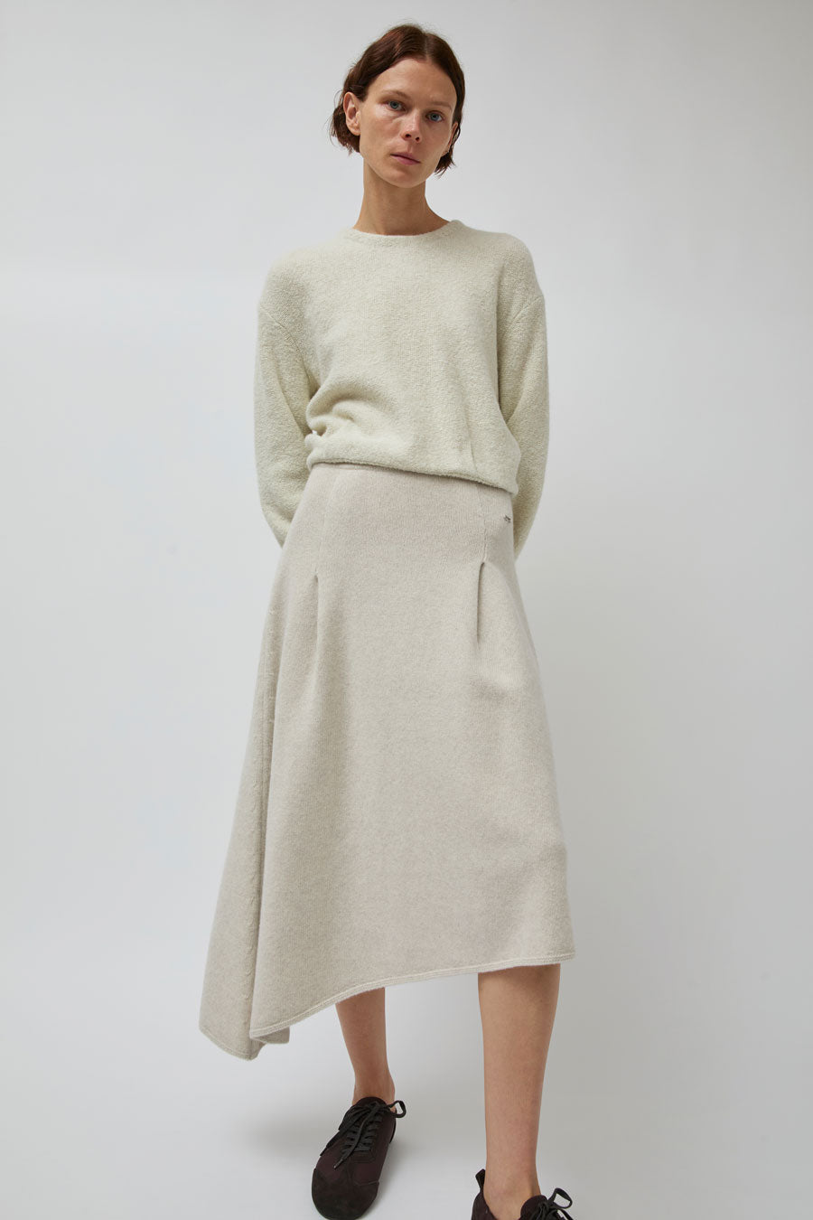 UMARMUNG Asymmetric Hem Skirt in Lamb