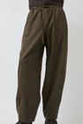 UMARMUNG Wool Flannel Oval Silhouette Pants in Dark Olive