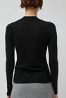 UMARMUNG Weightless Wool Crewneck Pullover in Black