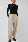 UMARMUNG Wool Flannel Oval Silhouette Pants in Cream