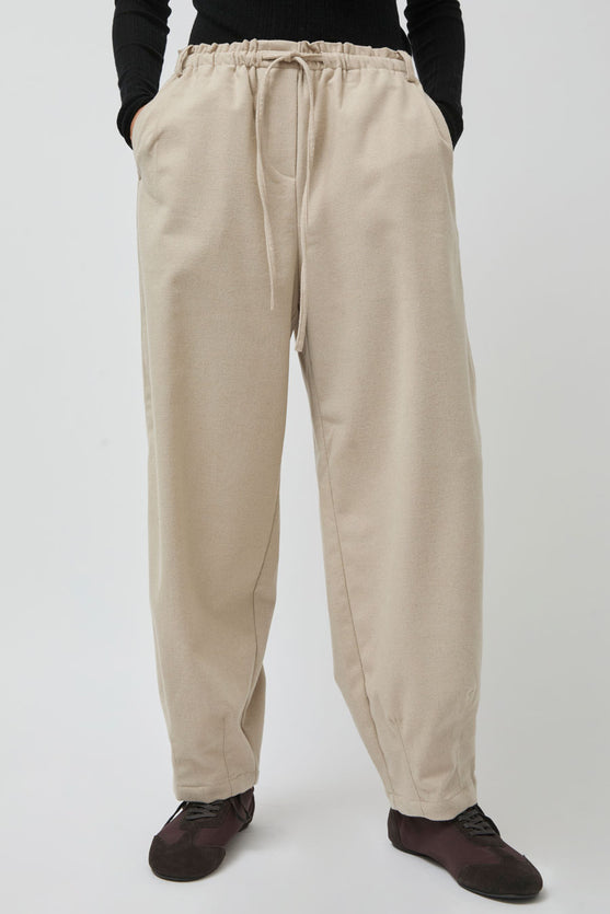 UMARMUNG Wool Flannel Oval Silhouette Pants in Cream
