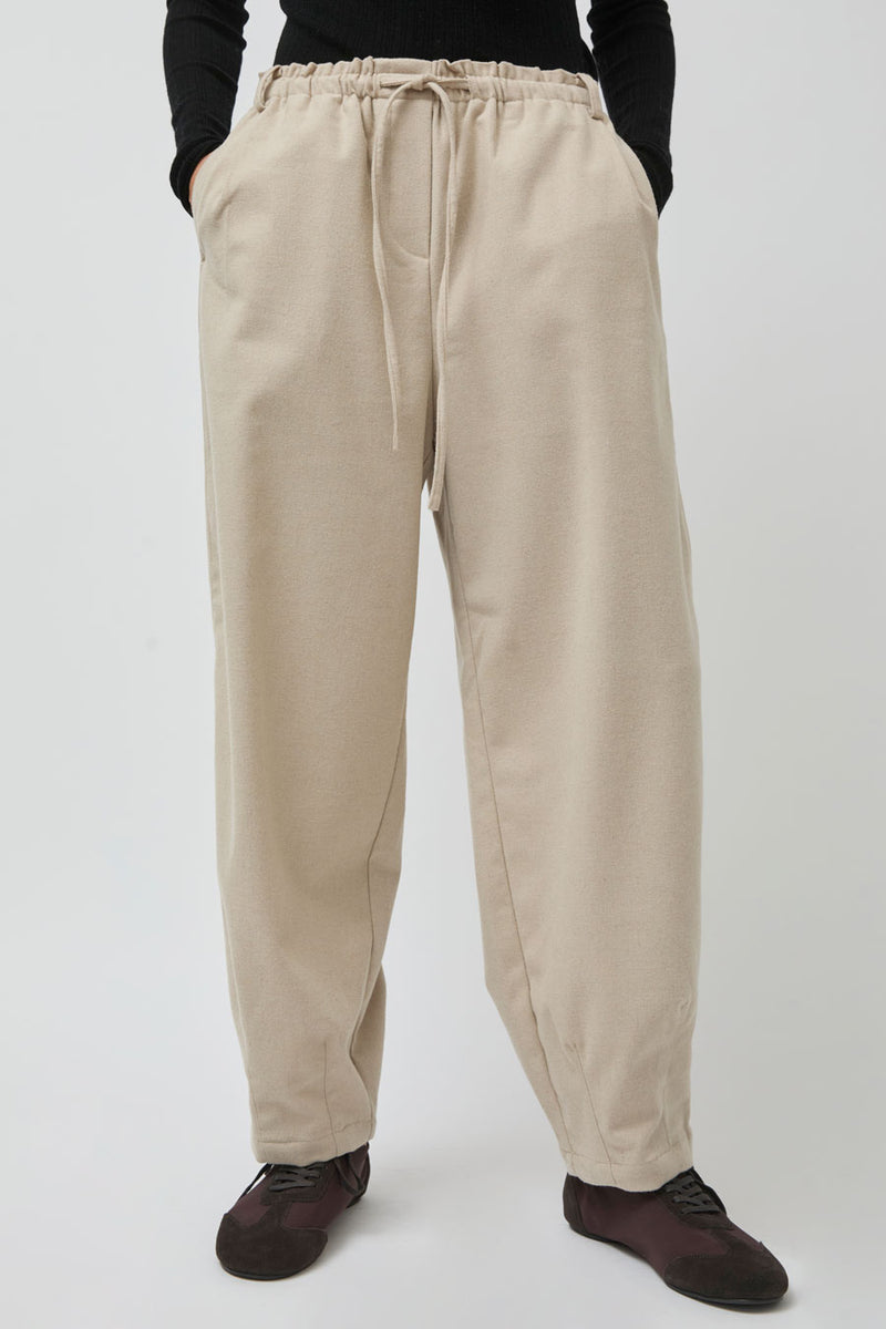 UMARMUNG Wool Flannel Oval Silhouette Pants in Cream