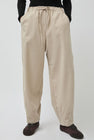 UMARMUNG Wool Flannel Oval Silhouette Pants in Cream
